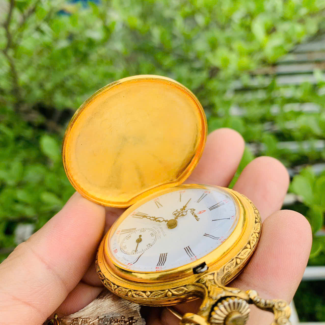 Đồng hồ quýt Aroma cót tay, cổ điển xưa