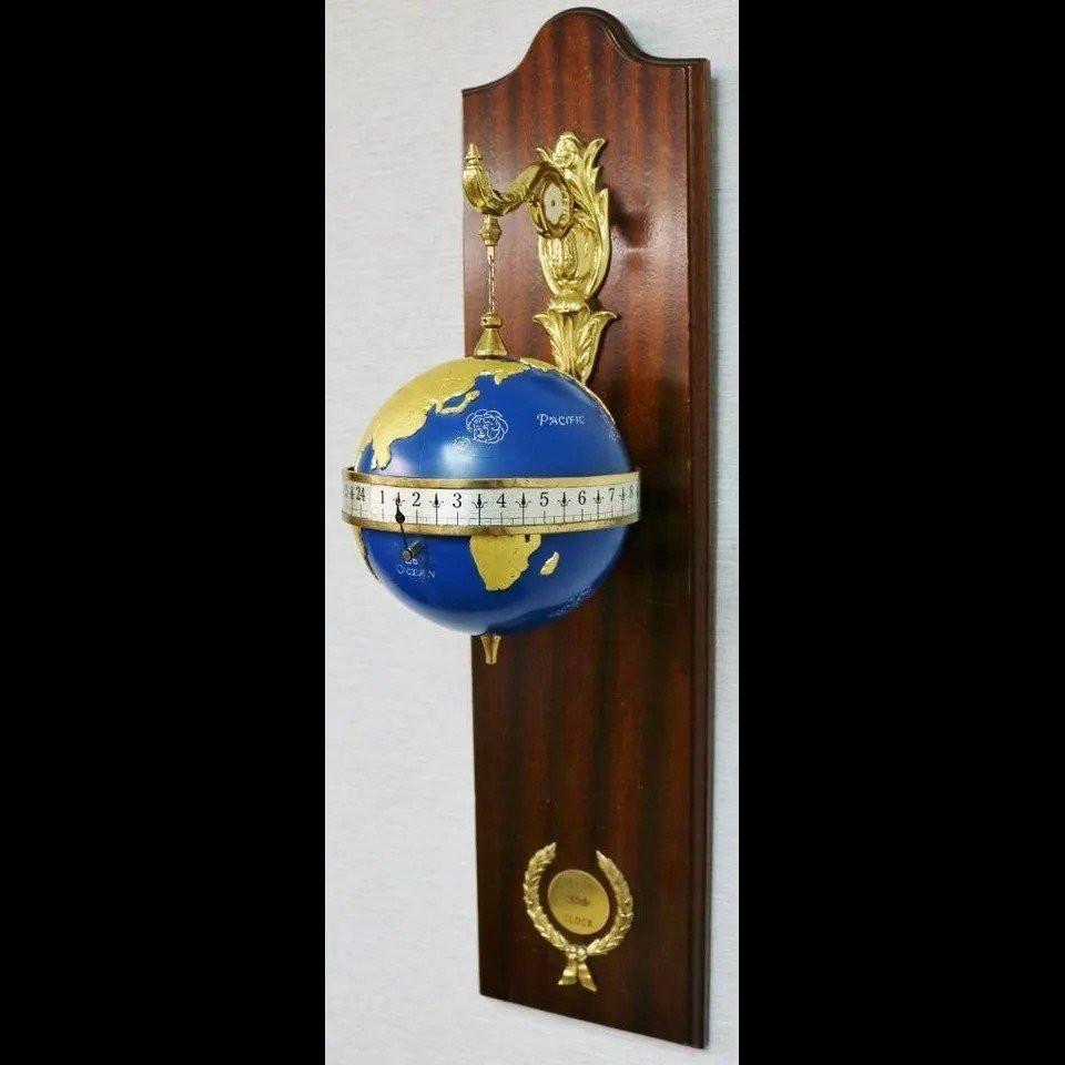 Very rare vintage mystery gravity wall clock with globe