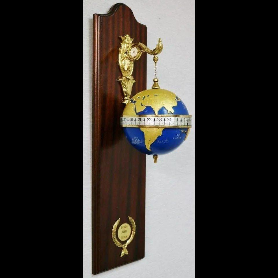 Very rare vintage mystery gravity wall clock with globe